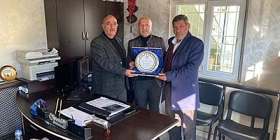 İŞADAMI AHMET SERDAR YAKAR'A PLAKET