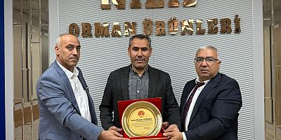 Şehitler ve Gaziler Derneği Başkanında Plaket Takdimi